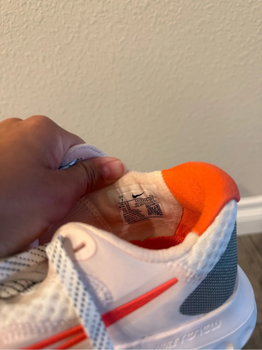 Women’s Nike White Sneakers with Orange Accents